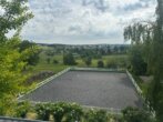 Bild5 - Wohn – Ensemble mit 2 Häusern, Stallungen, Reitplatz und Weiden!