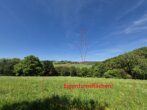 Blick auf den Ort und die Eigentumsflächen - Landwirtschaftliches Anwesen mit ca. 81,5 ha Land und diversen Gebäuden/Optionen
