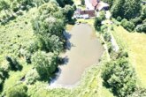 dji_fly_20250704_142206_148_1752047753809_photo.jp - Historisches Mühlenanwesen mit Weiher, Weiden und vielfältigem Nutzungspotenzial