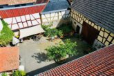 dji_fly_20250825_145734_257_1756128874107_photo.jp - Historischer Hof mit viel Charme und Ambiente – 2 Wohneinheiten und Pferdehaltung